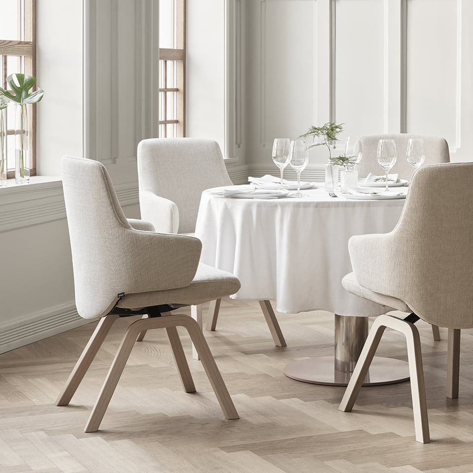 Stressless® Laurel dining chairs around a dining table
