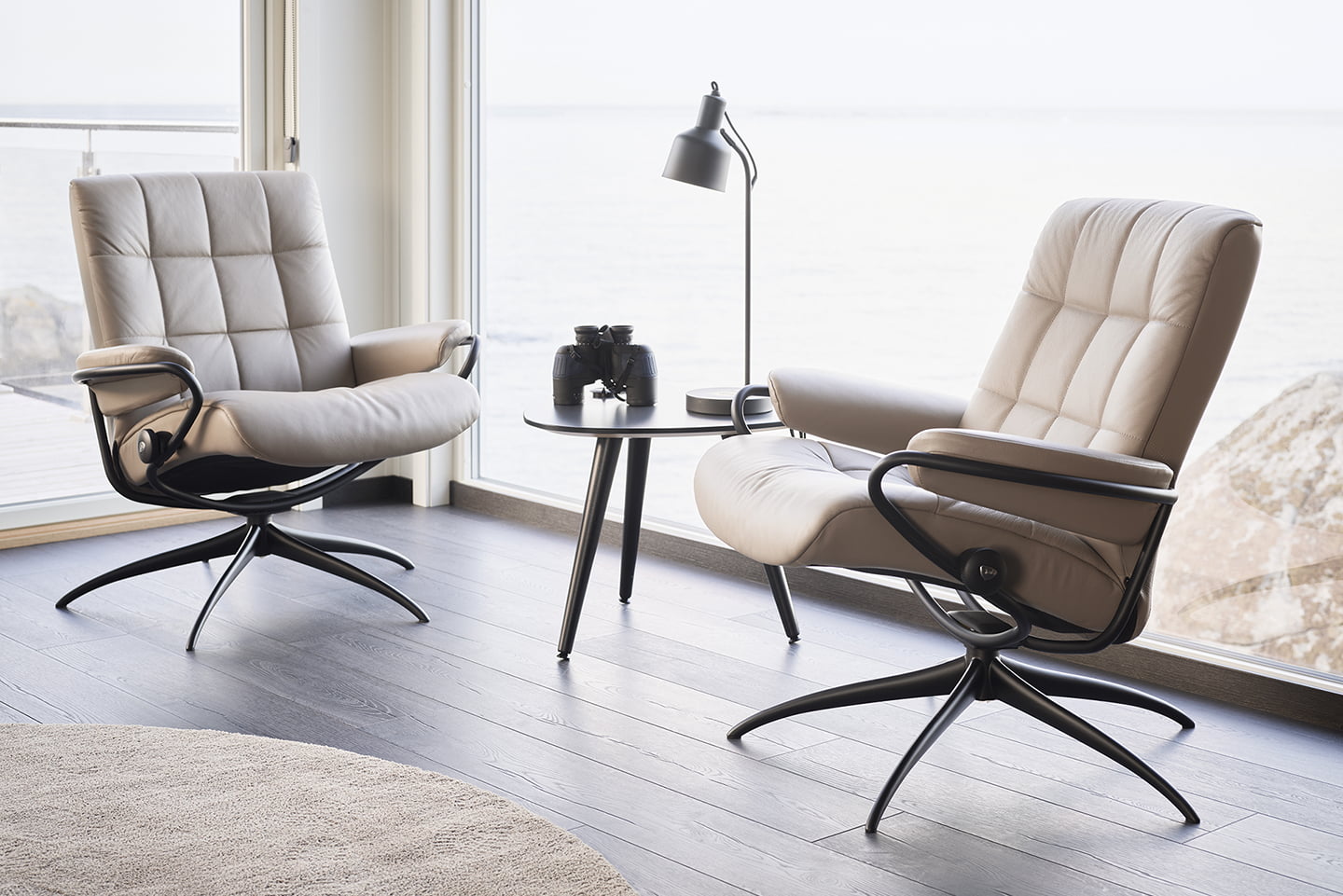 Stressless® London low back reliners around a table